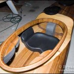 Shown it the prototype's cockpit. Note the Happy Bottom Seat and the foam pillar, and the knee braces fully padded out to make the boat fit like a tight glove.