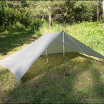 flat tarp setup in a modified pyramid