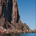 Kayaker and Palisade Head Kayaker and Palisade Head