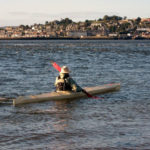 Bill Samson paddling his baidarka.